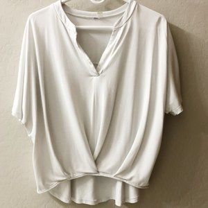 White blouse pleated front